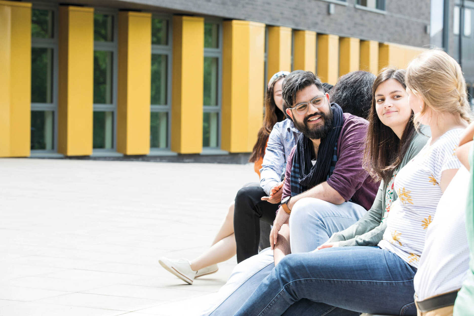Kent students outside Sibson building on Canterbury campus