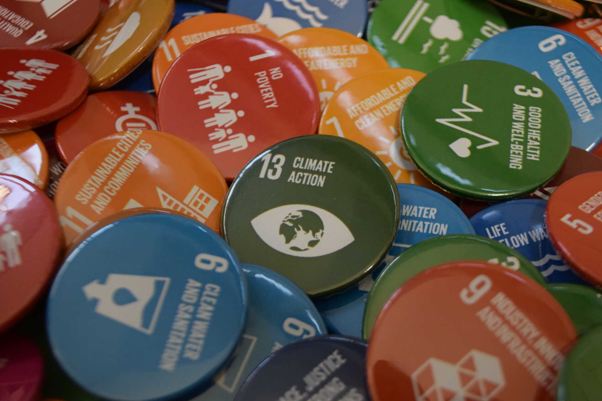 A collection of different badges representing the United Nations' Sustainable Development Goals